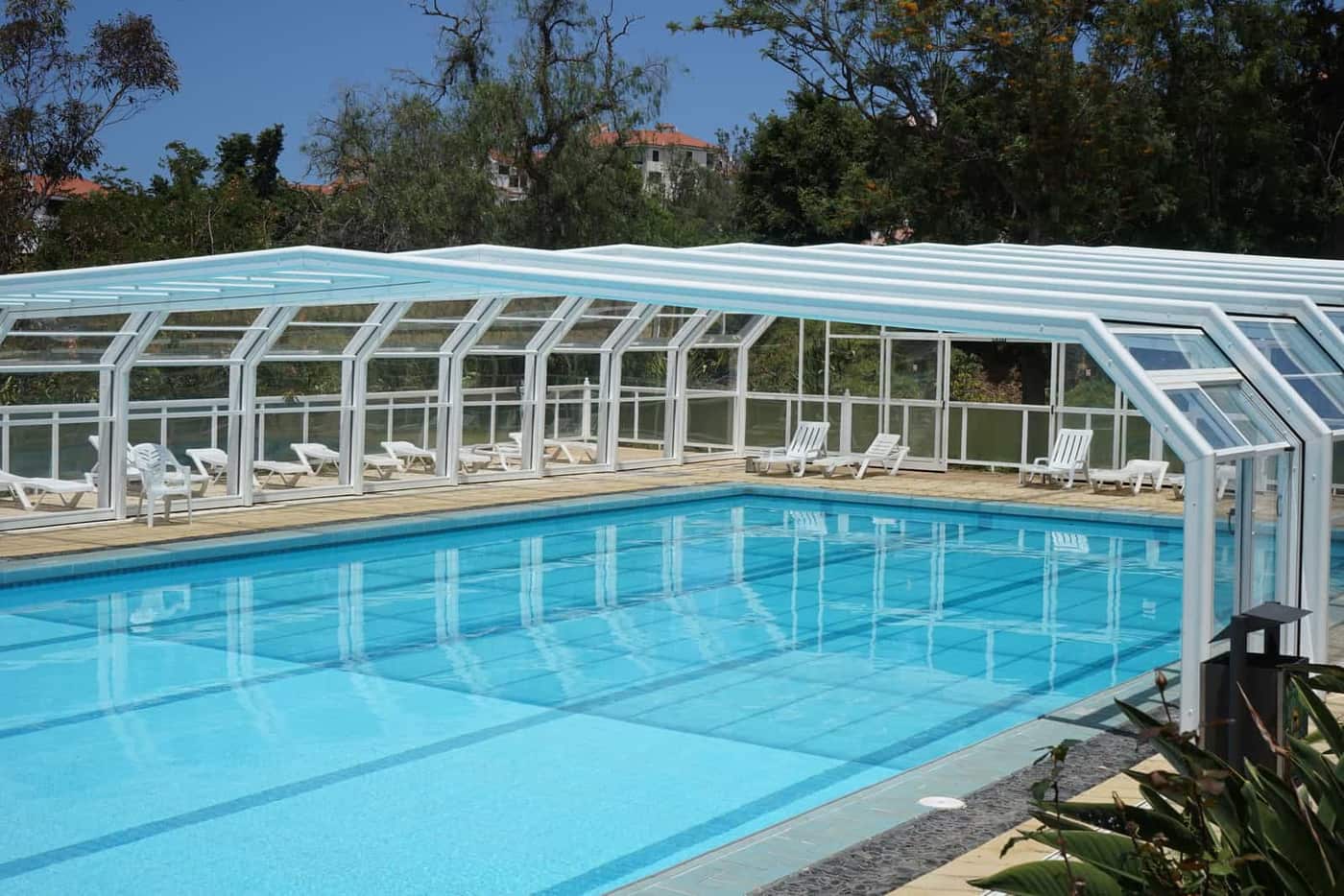 A cover stretched over a swimming pool to keep debris out